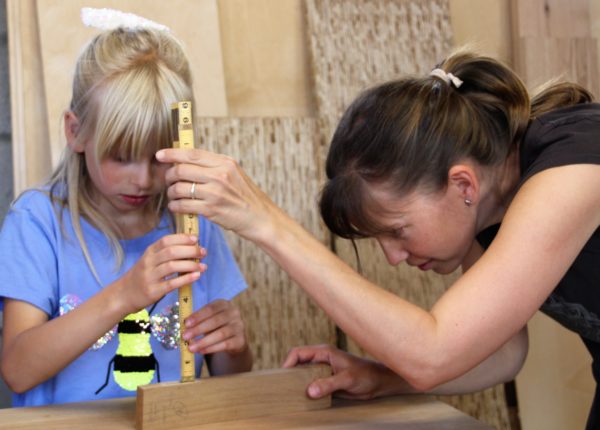 young girl woodworker