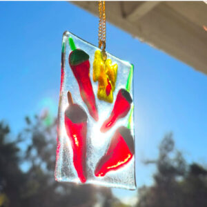 fused glass sun catcher with chili peppers