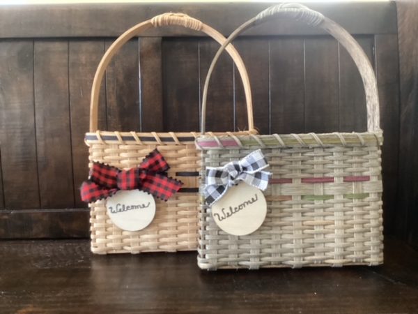 2 examples of door baskets with welcome tags