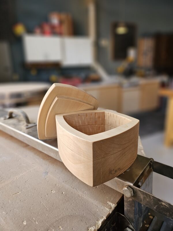 close up of bandsaw box with lid in woodshop
