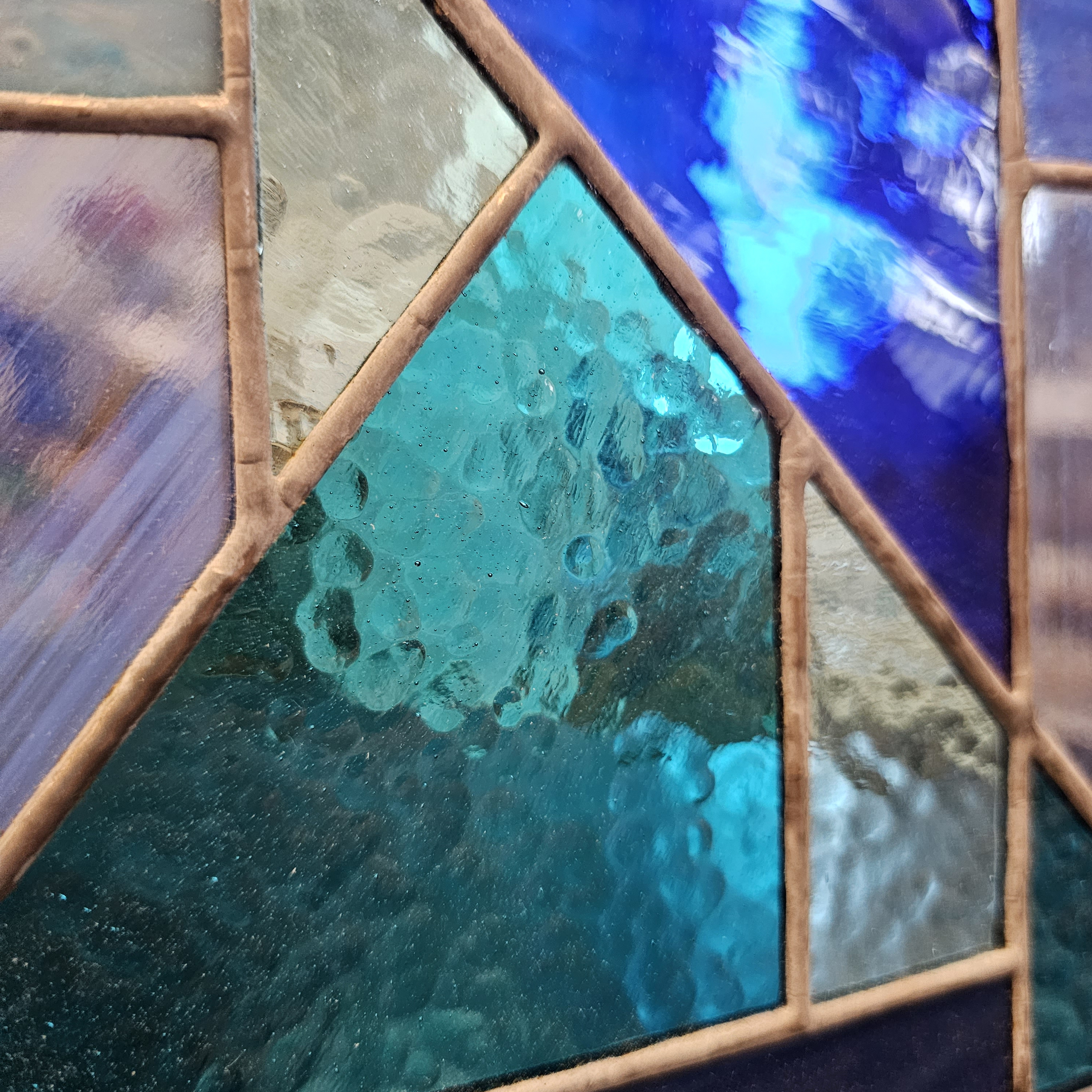 close up of blue stained glass