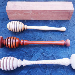 close-up of woodturned honey drippers