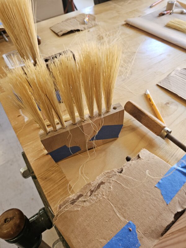 wooden brush making with tampico fibers