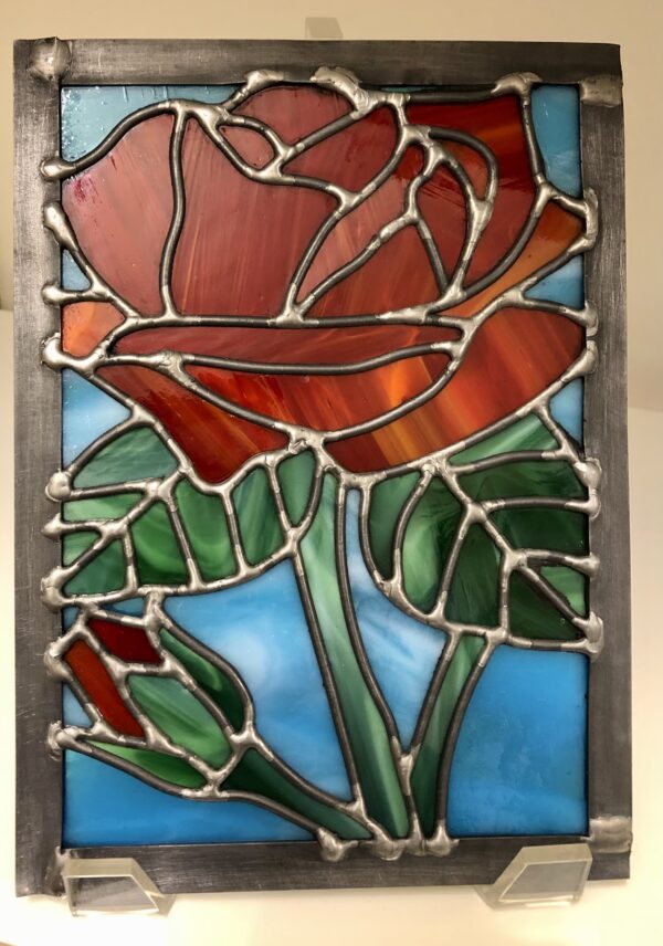 close up of rose stained glass piece