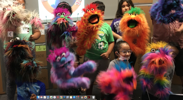 Kids with handmade puppets