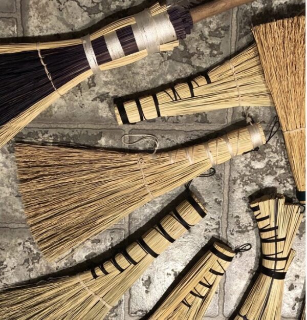 close-up of handmade brooms