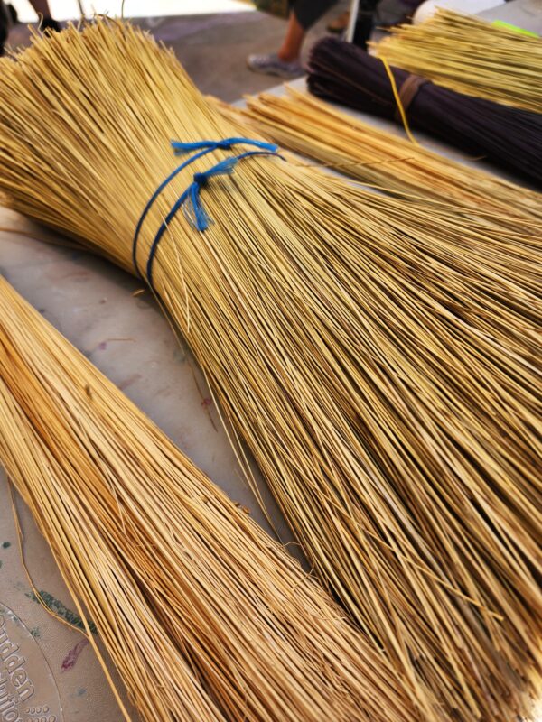 close up of broom making supplies