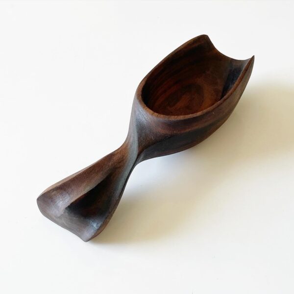 close up of power carved spoon scoop