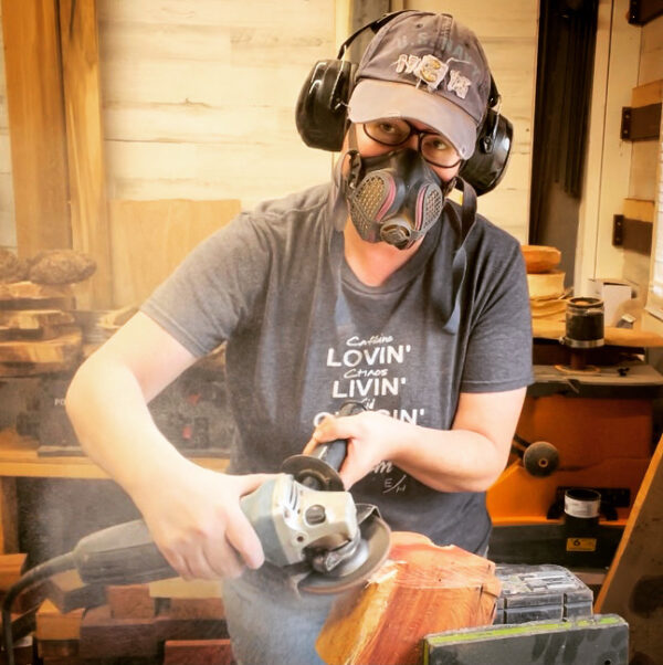 woman power carver in woodshop