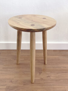 side view of 3-legged wooden stool