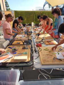 students working at tables on Stained Glass Flowers