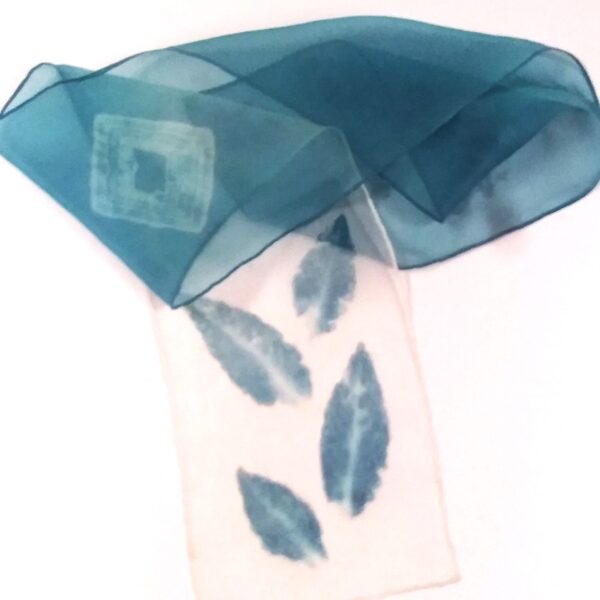 silk scarf dyed with fresh indigo natural dye with blue leaf imprints