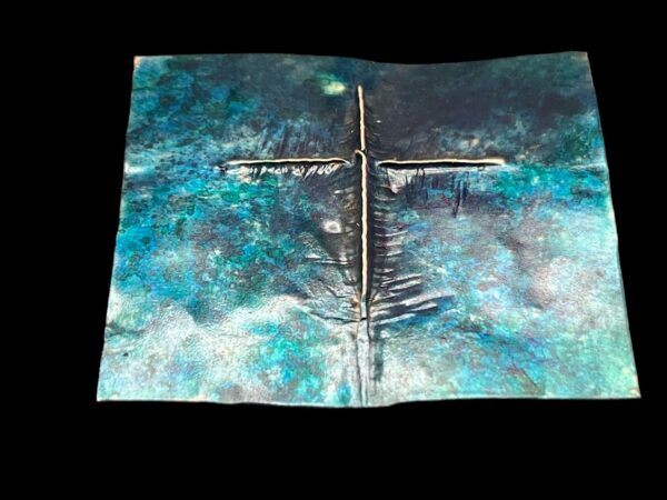 Foldforming and patinas on flat blue piece