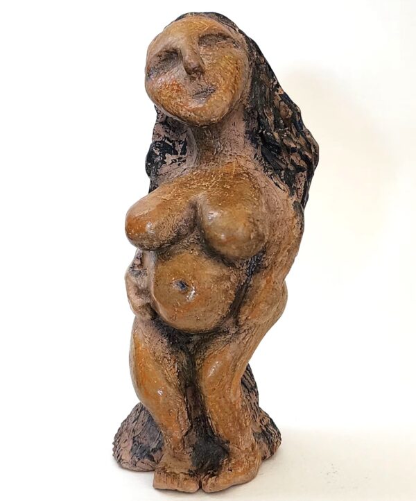 handmade clay figure of a female