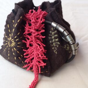 close up of small stitched purse