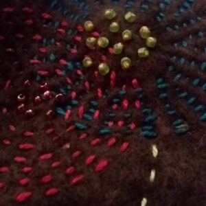close up of small stitched fabric