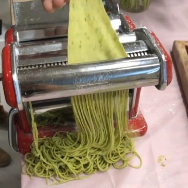 homemade pasta in a pasta press