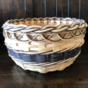 close up of handwoven basket in black and natural