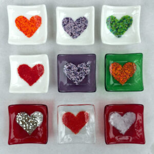 close up of fused glass trays with hearts