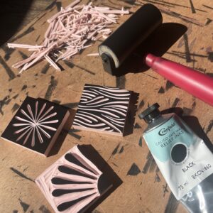 carved blocks, roller and ink