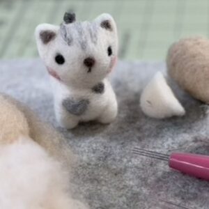 tiny needle felted kitten figure