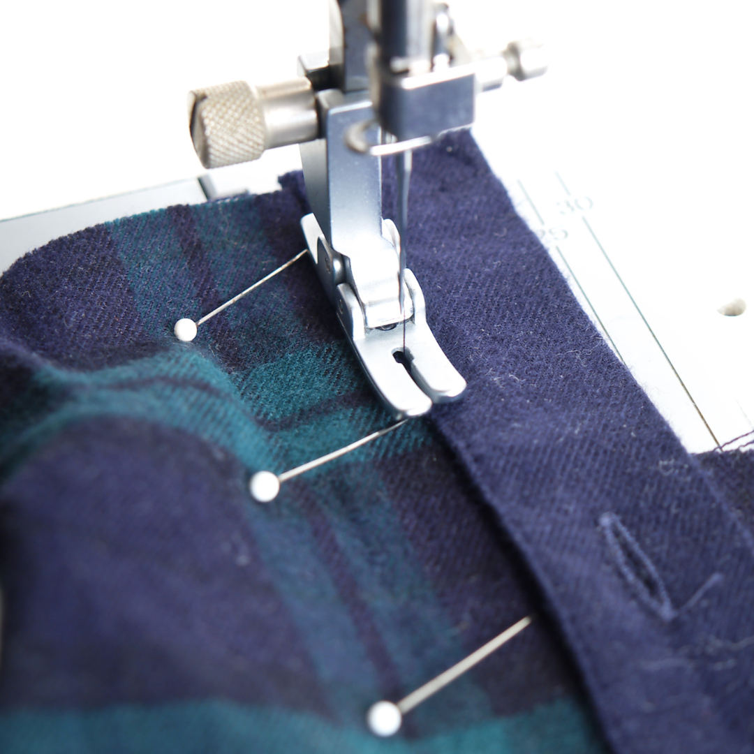 sewing machine with pins in placket