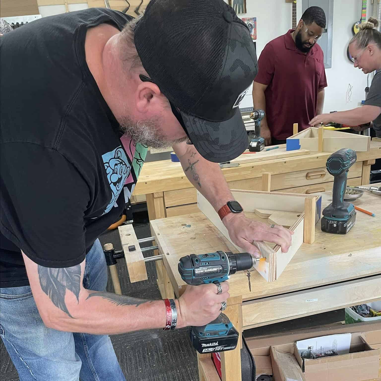 persons woodworking in woodshop