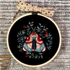 needle felted 2d with embroidery on a hoop