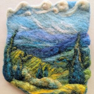 needle felted hilly landscape scene