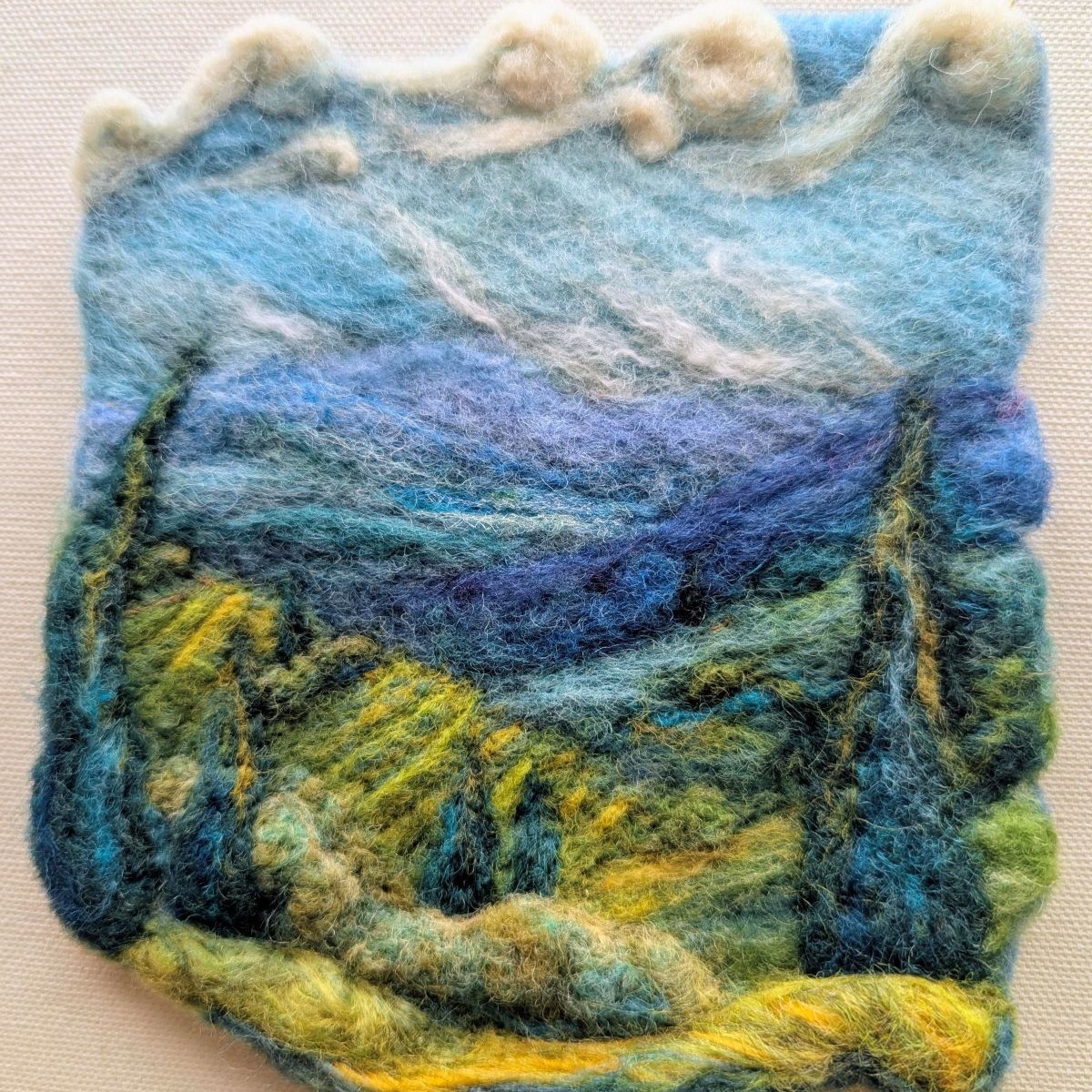 needle felted hilly landscape scene